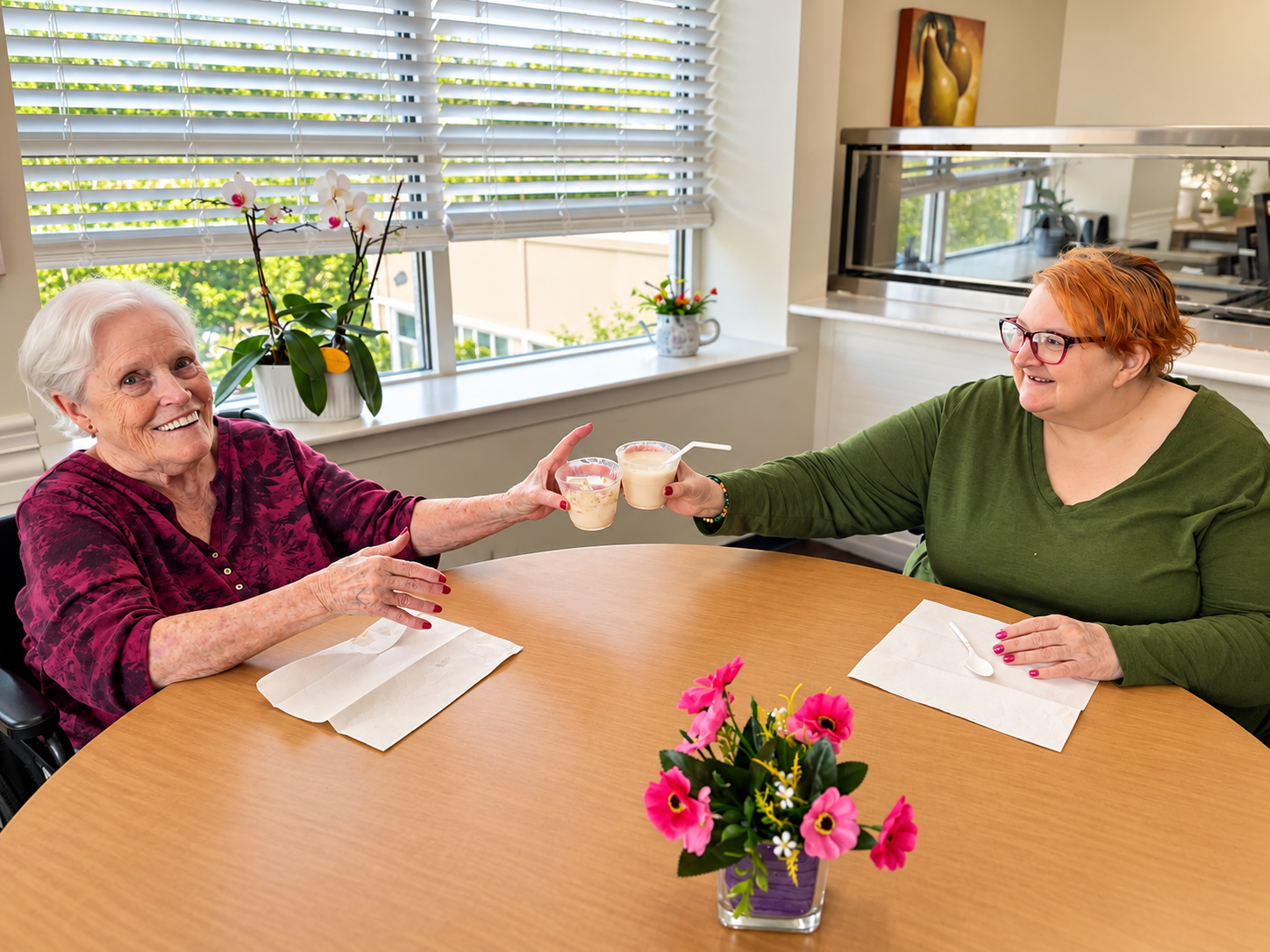 Mother and daughter smiling and enjoying coffee together at LaurelHurst in Portland, Oregon